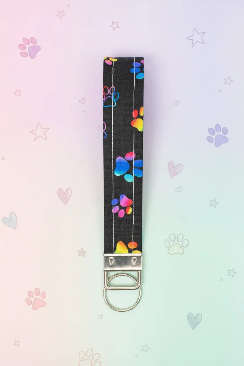 Keychain with colorful paw prints on a white background