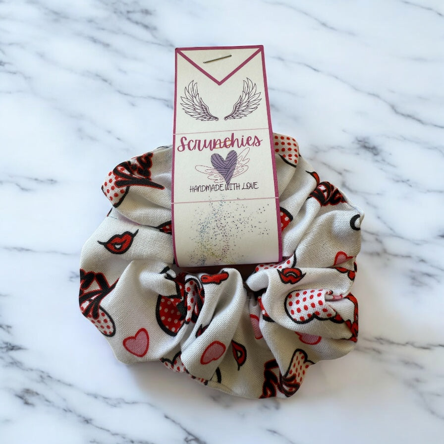 Scrunchie with heart pattern on a marble surface