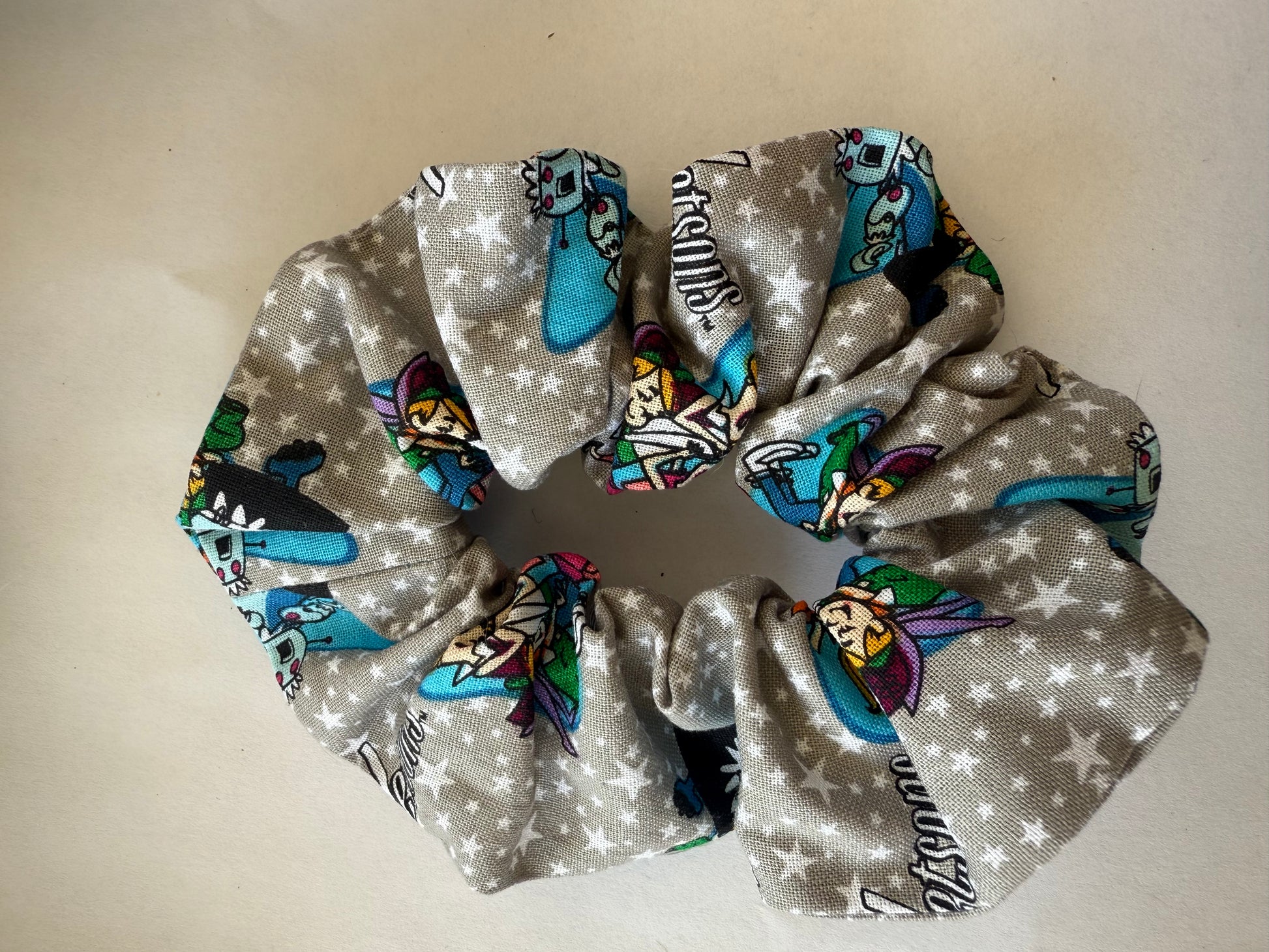 Scrunchie with fairy design on a light background
