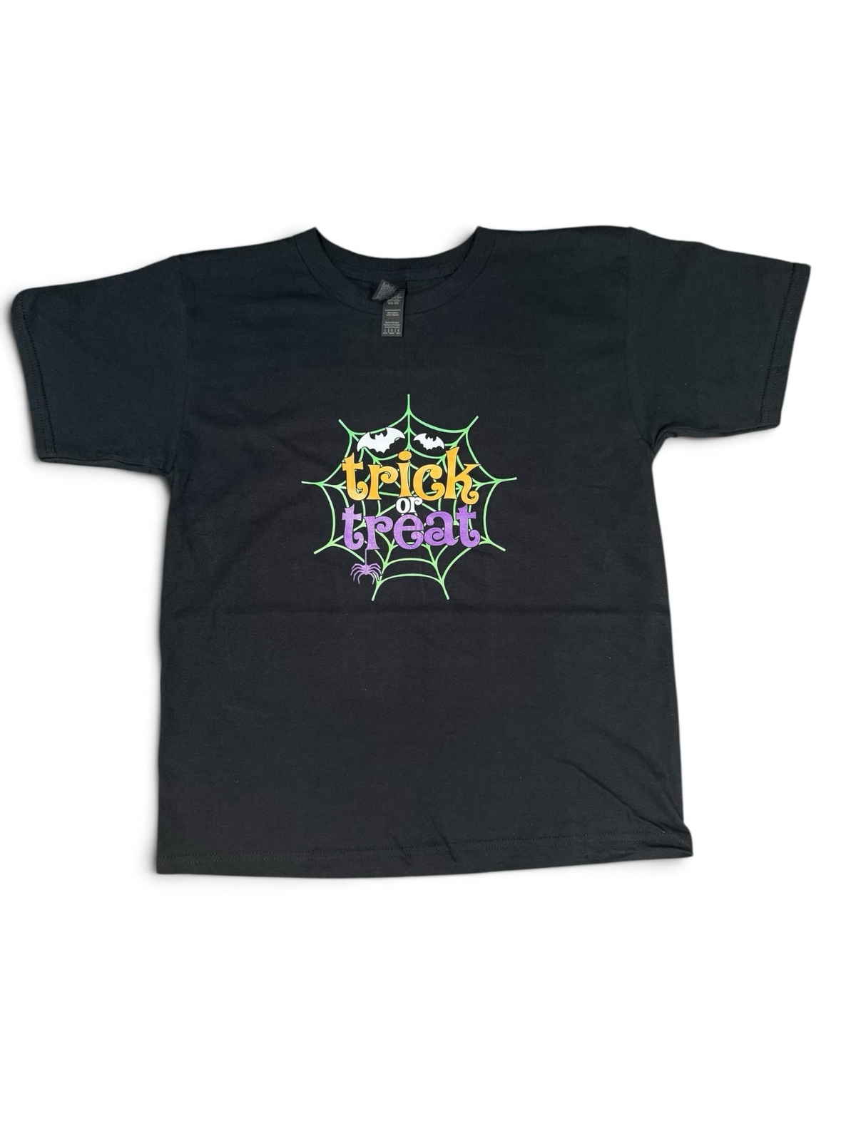 Crafts by Serenity black cotton t-shirt featuring a Trick or Treat graphic with a spiderweb, bats, and a spider.