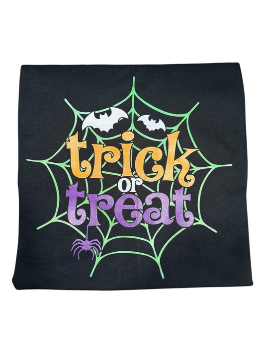 Crafts by Serenity black cotton t-shirt featuring a green spiderweb, bats, and colorful Trick or Treat graphic print.
