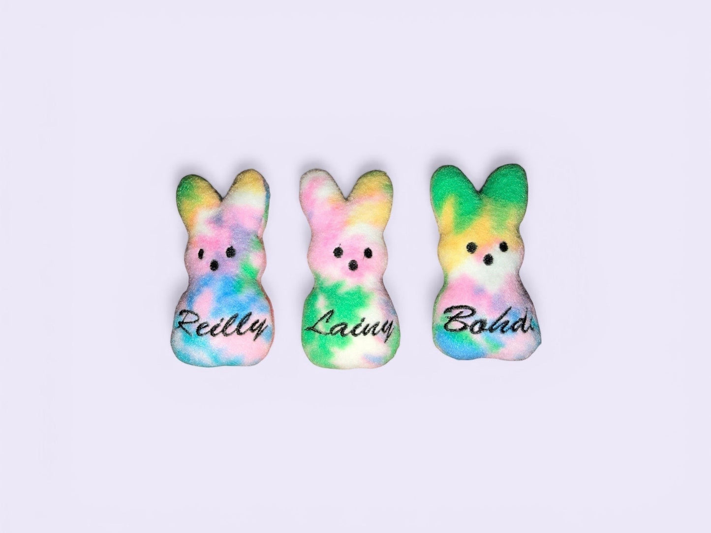 Crafts by Serenity personalized tie-dye plush bunny keepsakes with custom names, perfect for Easter gifts.