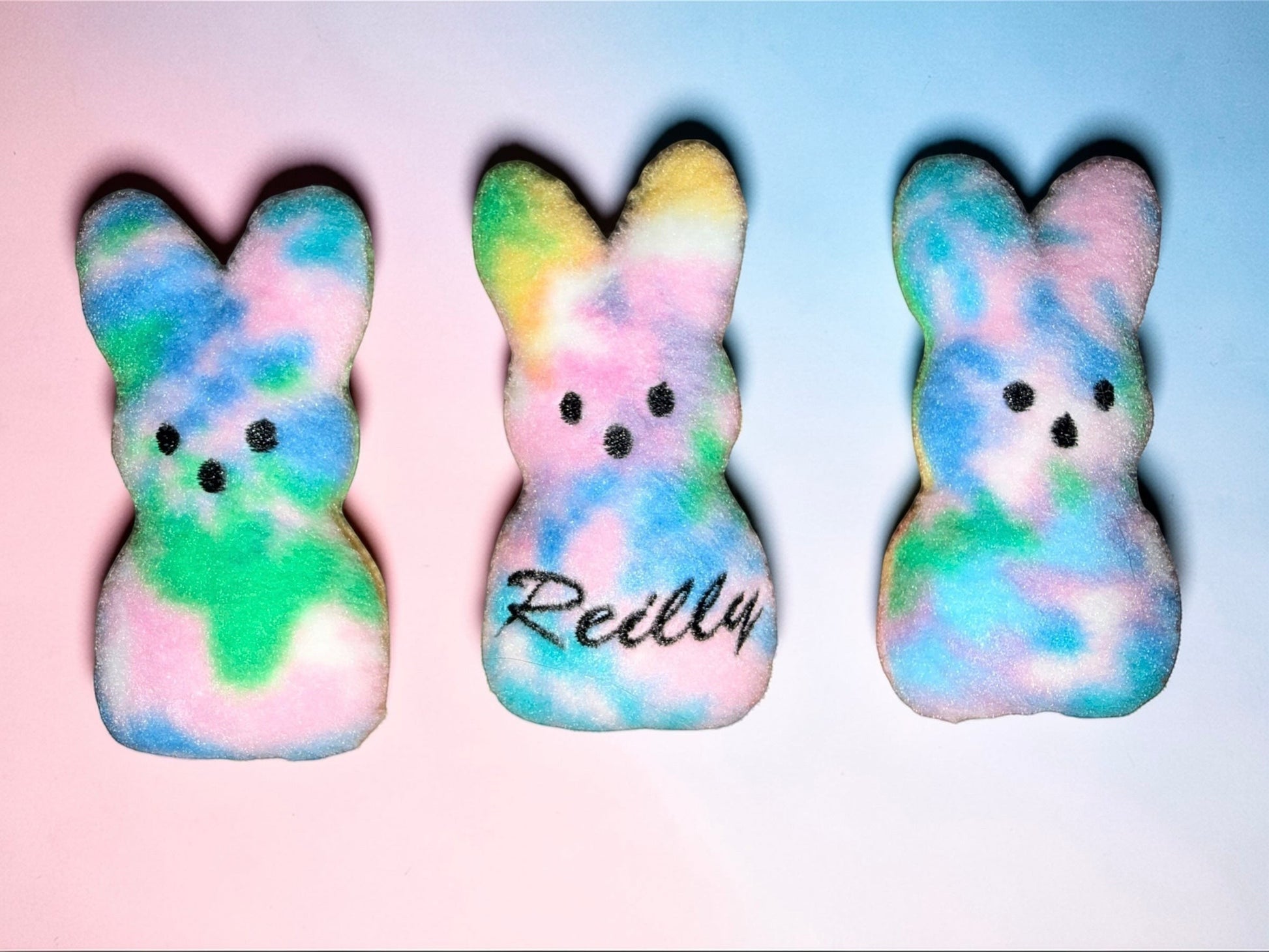 Crafts by Serenity personalized tie-dye plush bunny keepsake with custom name embroidery for Easter gifts.