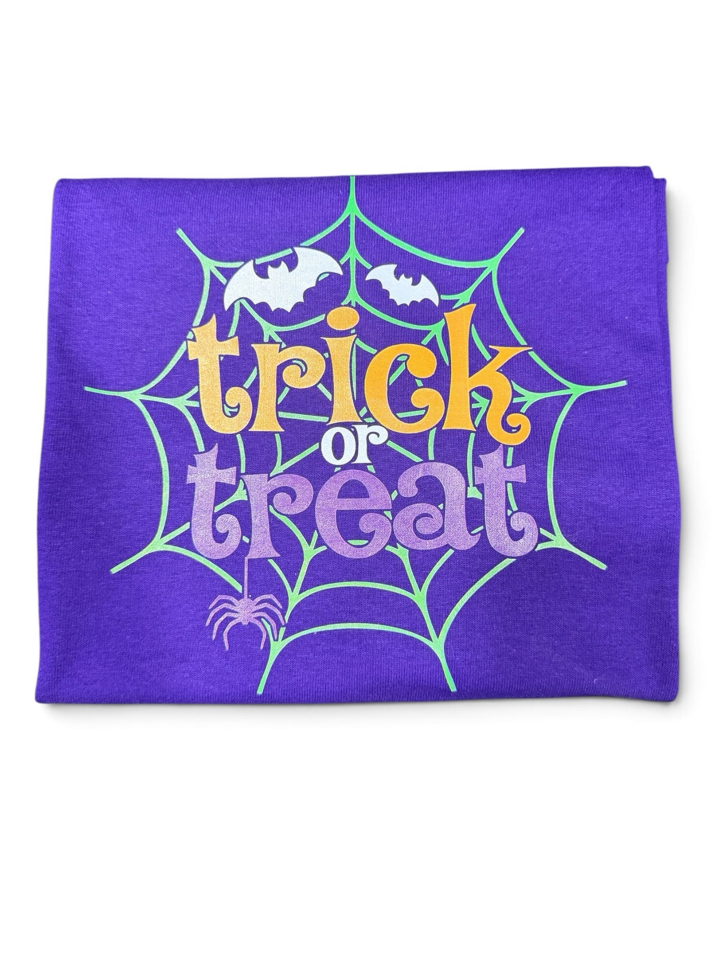 Crafts by Serenity purple cotton t-shirt with Trick or Treat graphic, spiderweb, bats, and spider design.