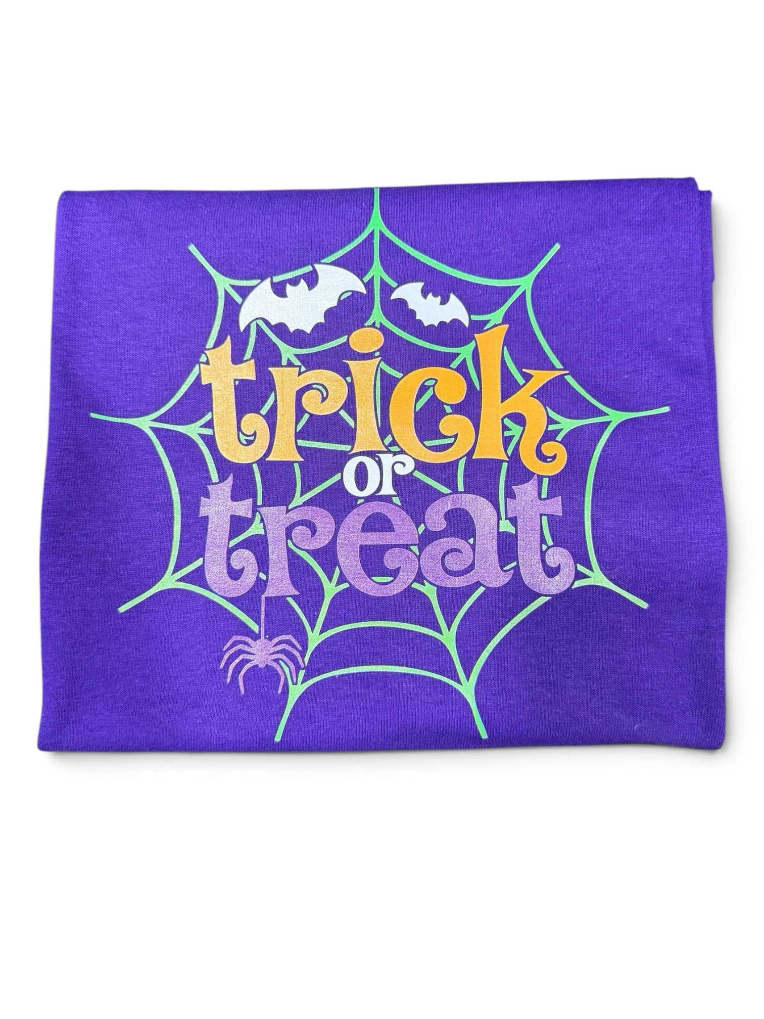 Crafts by Serenity purple cotton t-shirt with Trick or Treat graphic, spiderweb, bats, and spider design.
