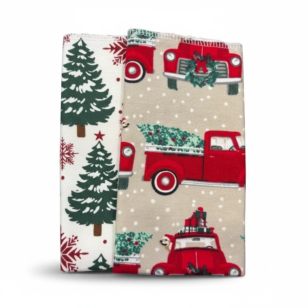 Crafts by Serenity reusable paper towels with festive holiday truck, tree, and snowflake patterns in red and green.