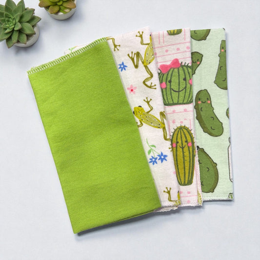 Crafts by Serenity mystery bundle of 12 eco-friendly reusable paper towels with assorted fun patterns and solid green.